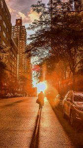 Riding a bicycle into the sunset